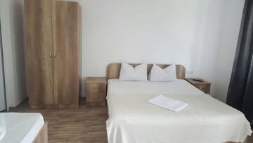 Фото номера Семейный номер с балконом Гостевой дом Pensiunea Casa Albă г. Беклян 8